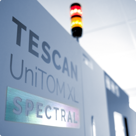 Device featuring TESCAN UniTOM XL Spectral logo